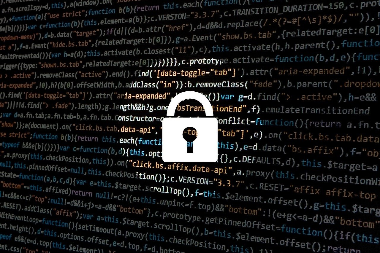 „L3Harris-vezető kémkedési botránya – hacker és adatlopás illusztráció Volt L3Harris-vezető kiberkémkedés miatt vád alatt – illusztráció hackerrel és adatlopással